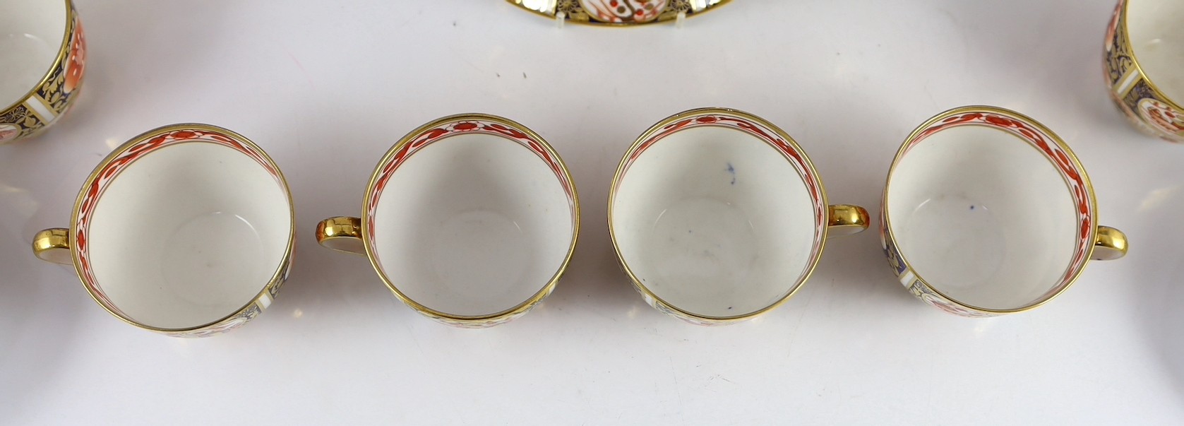 A Spode part tea service painted in Imari style with pattern 1956, c.1820